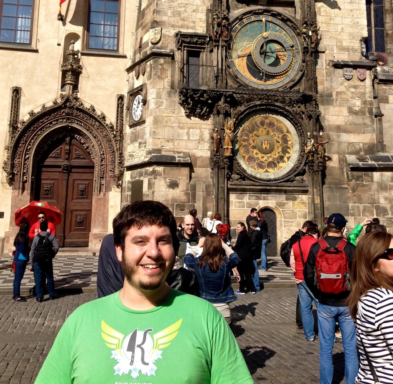 Chris standing in front of the Prague astronomical clock.