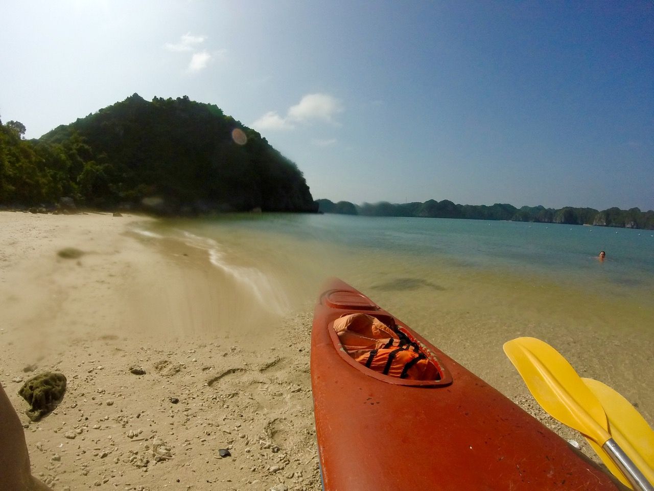 Kayak sitting on a beach.