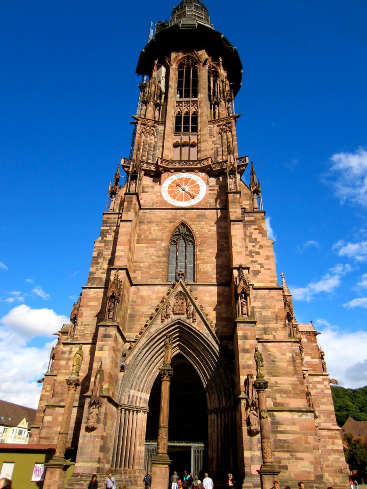 An old church tower with a clock.