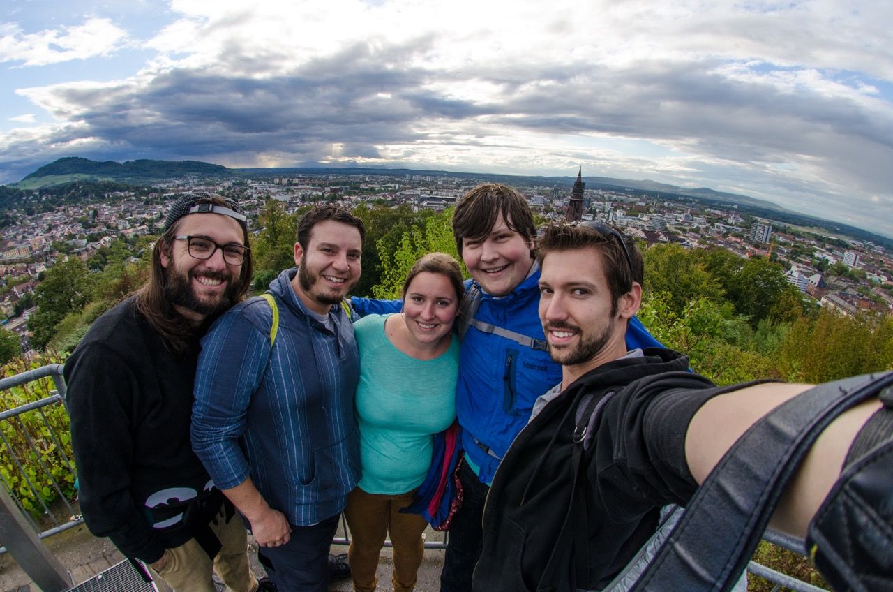 Group photo of friends from the top of Schlossberg.