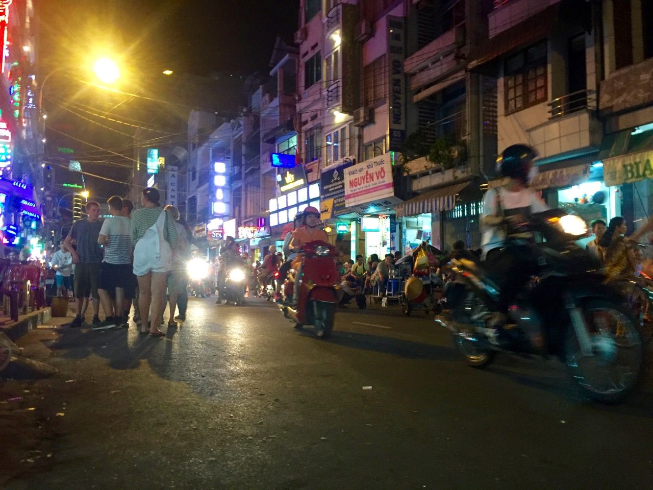 A busy party street in District 1.