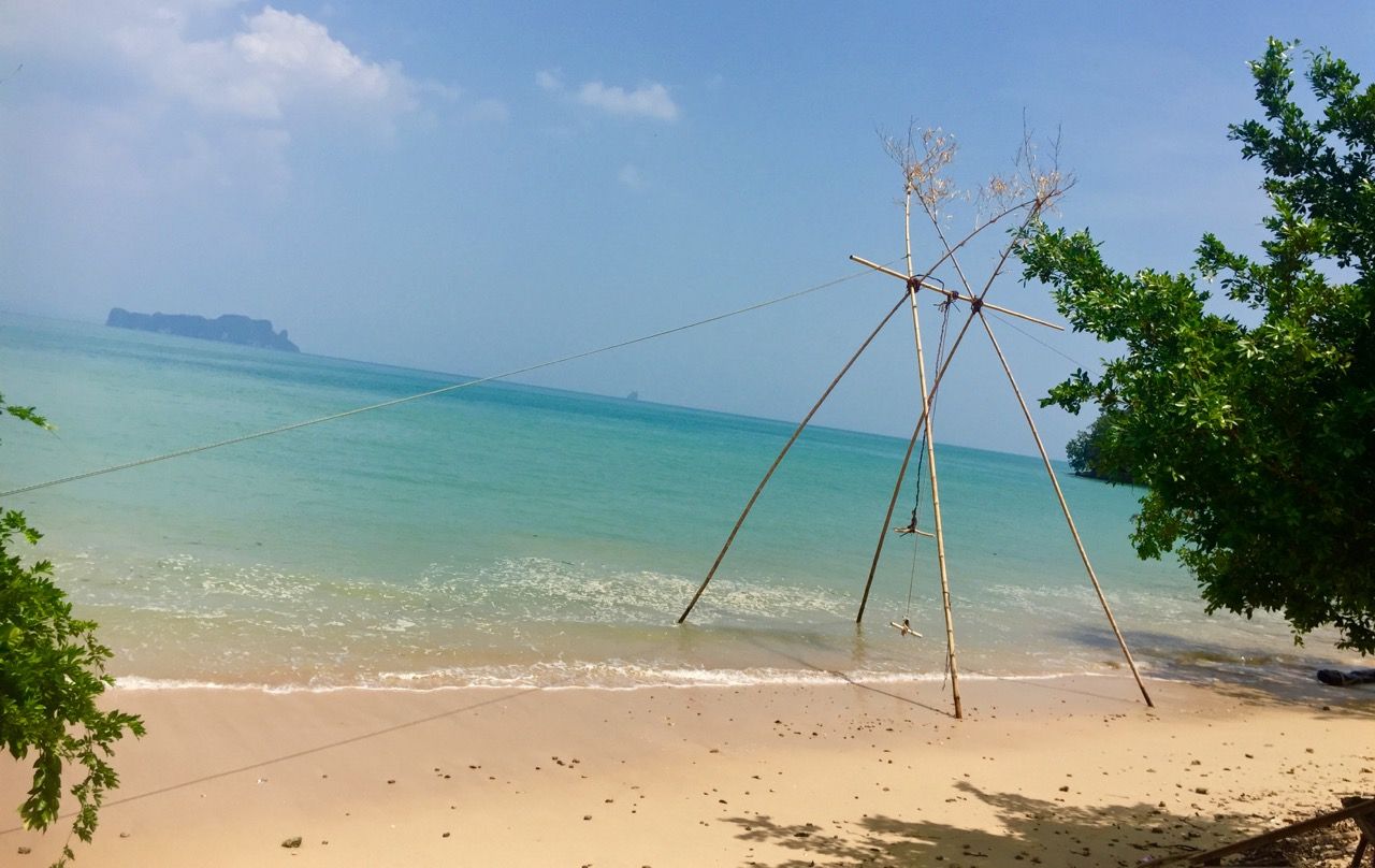 Giant bamboo swing on the beach.