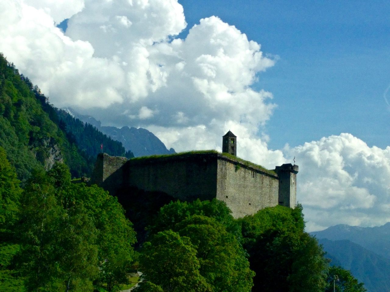 A castle on a mountain near the autobahn.