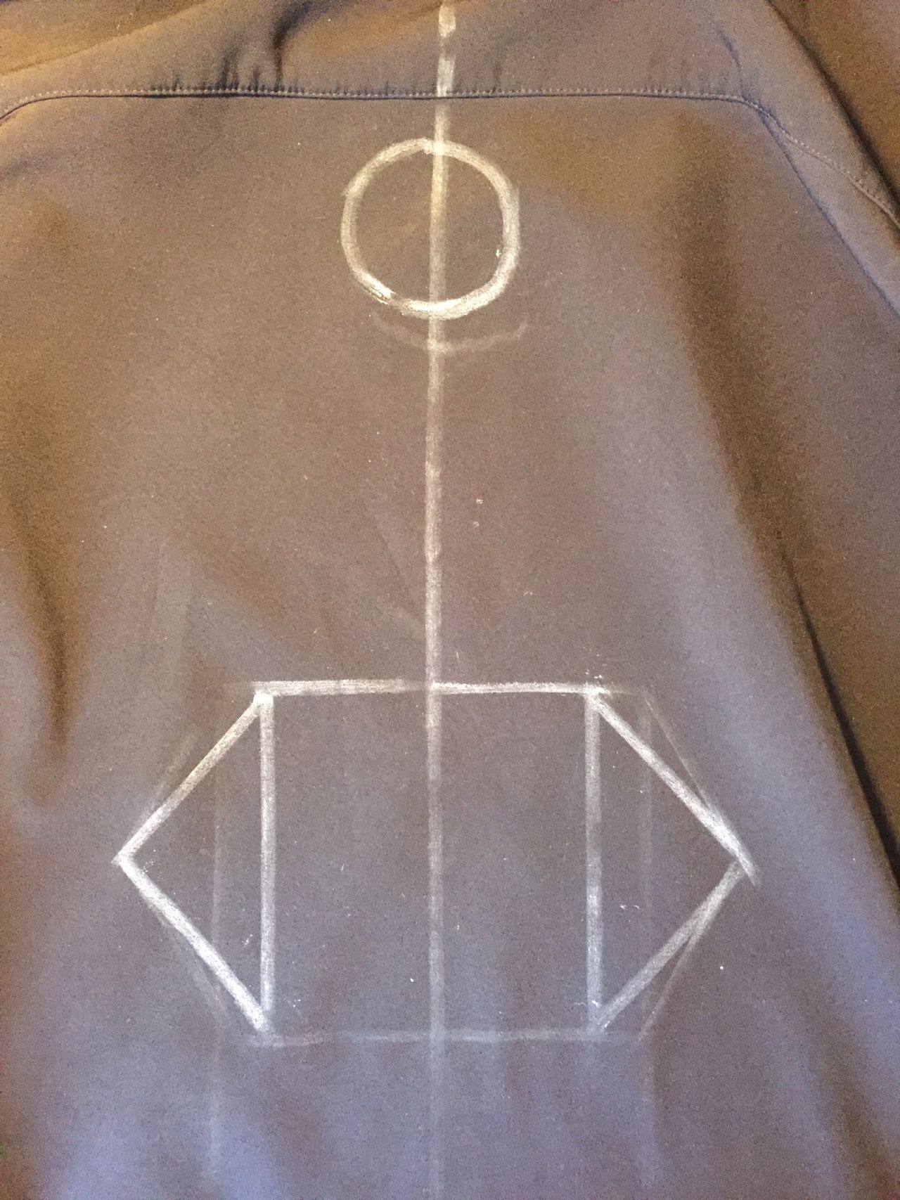 Chalk diagram drawn onto jacket.