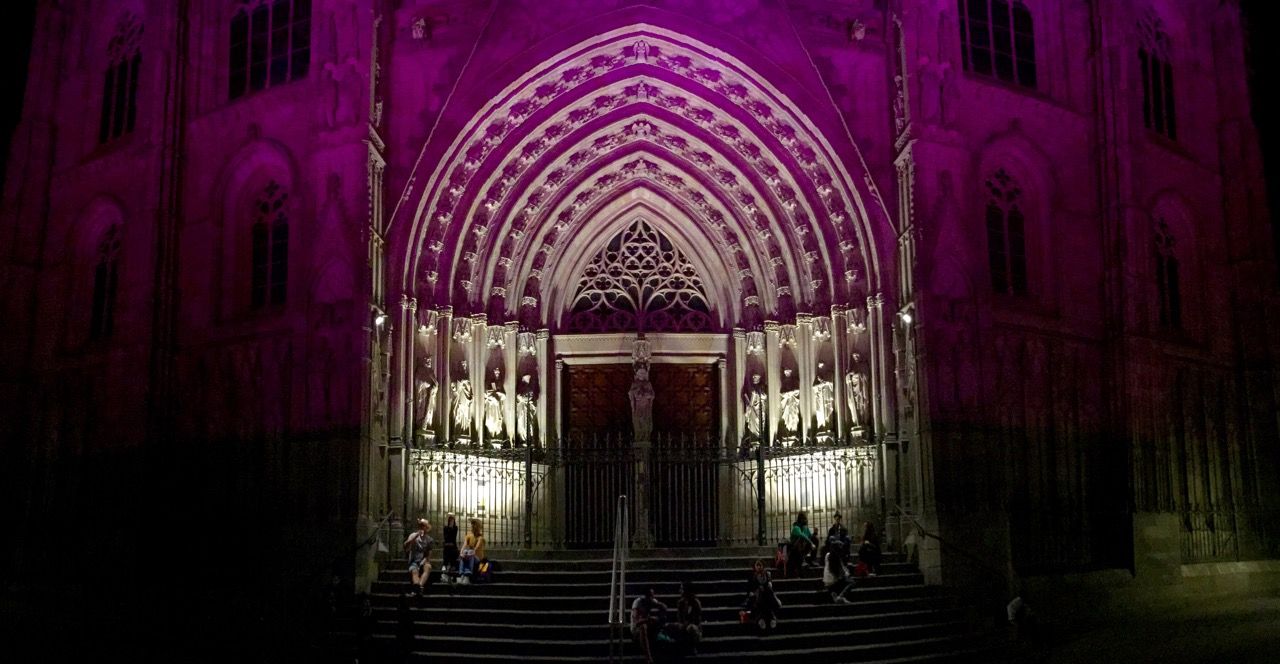A church lit by purple light.