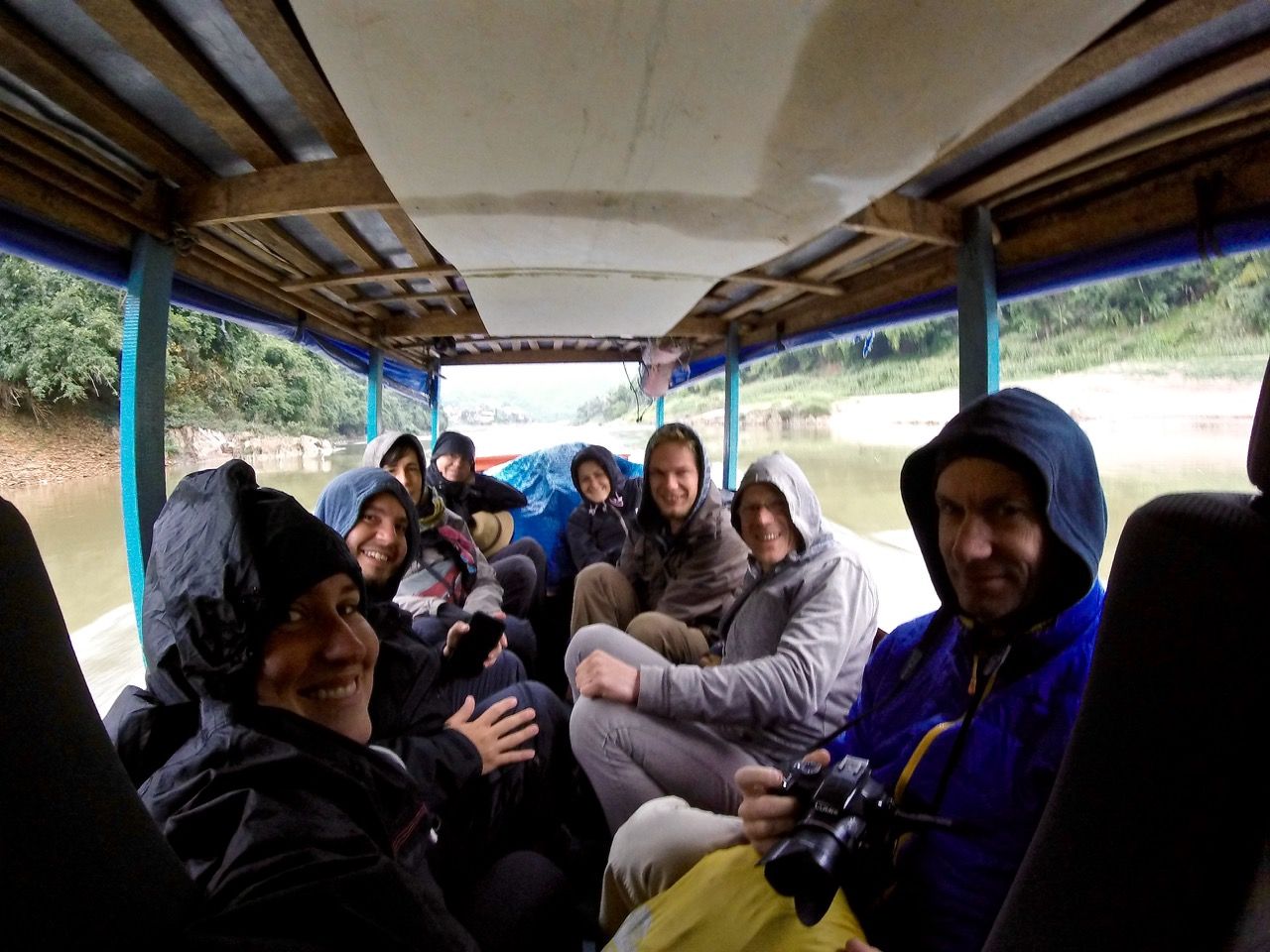 Group of people inside a slow boat.