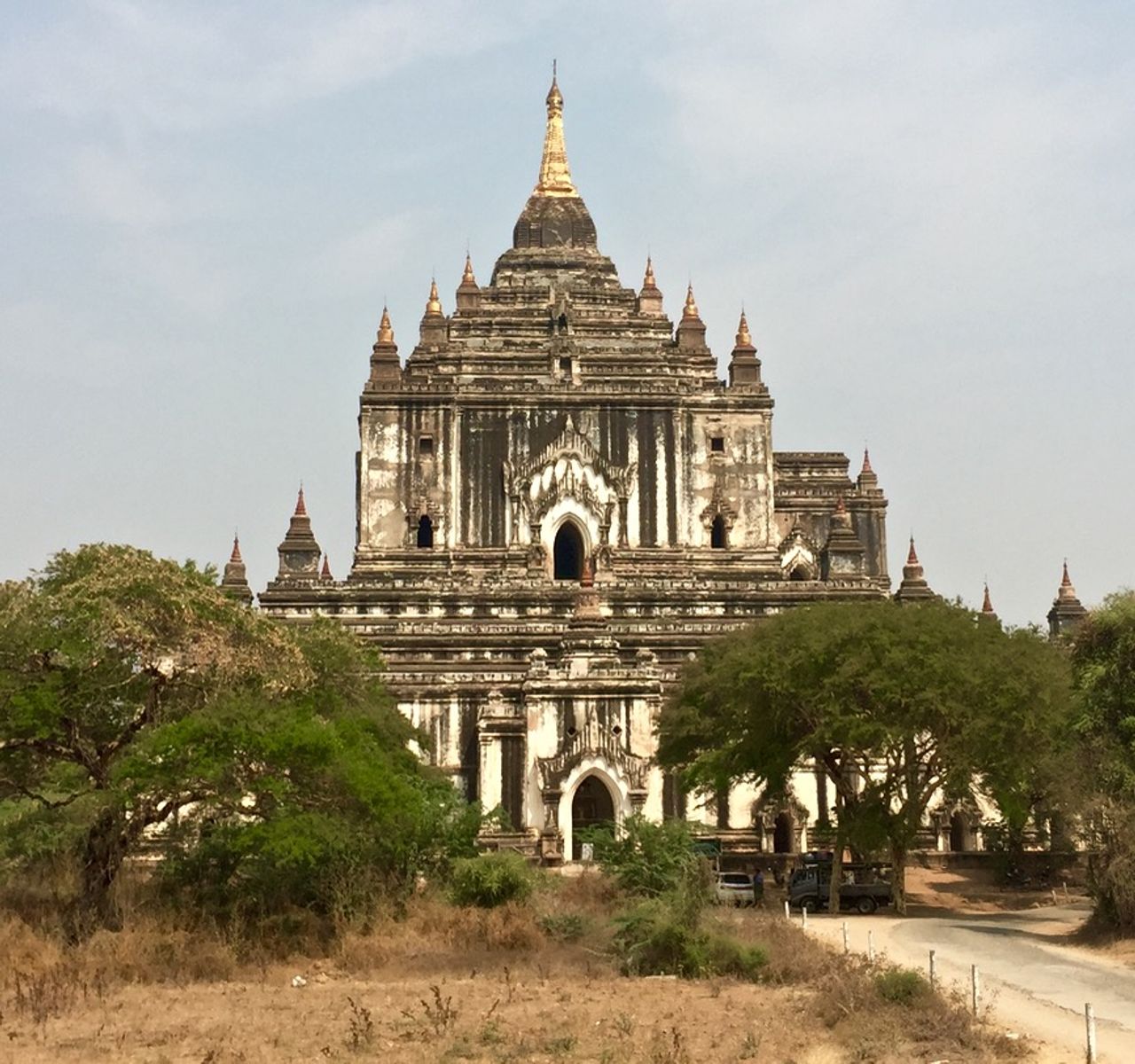 A large white temple as seen from a distance.