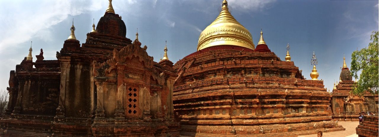 Panoramic of a large temple with pure gold stupa.