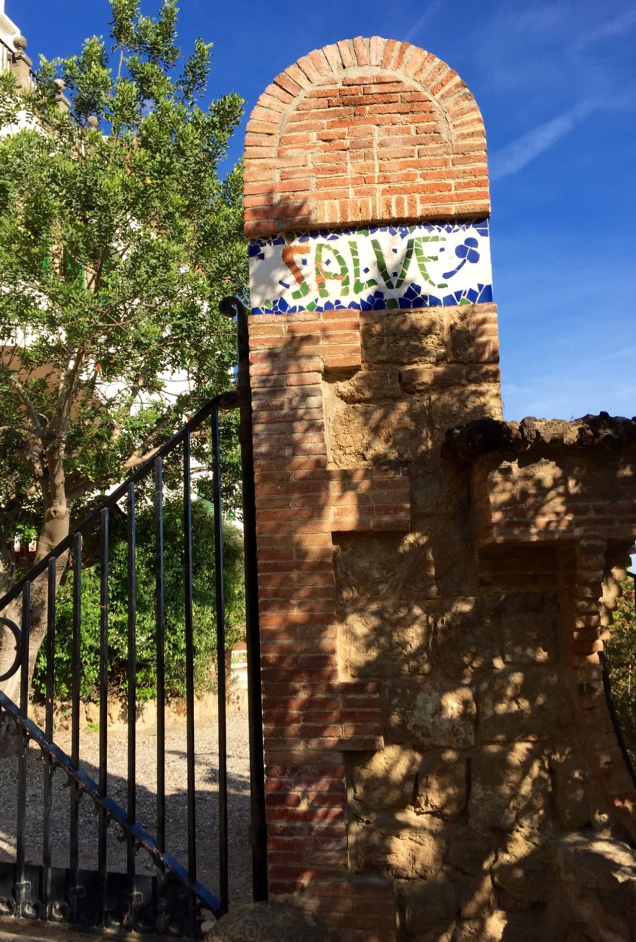 A mosaic sign with the word "Salve"
