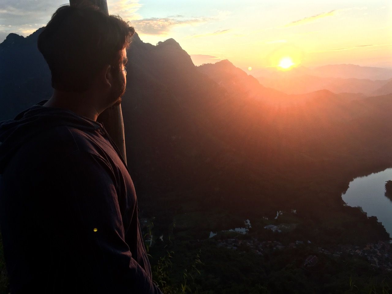 Man looking at sunset.