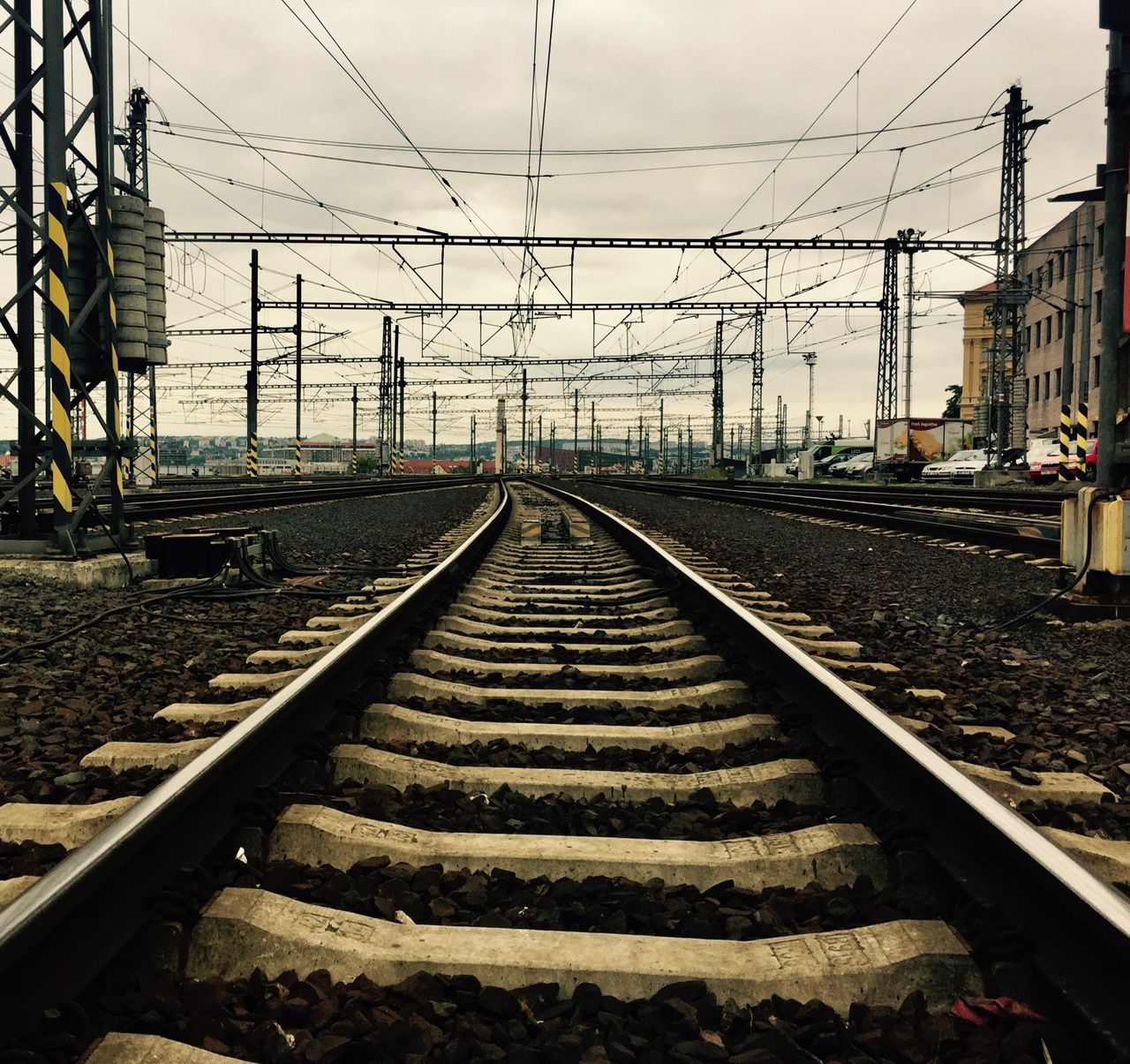 Railroad tracks and overhead cables.