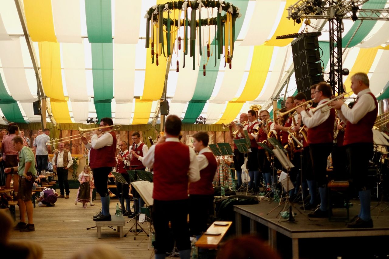 Band playing in a tent.