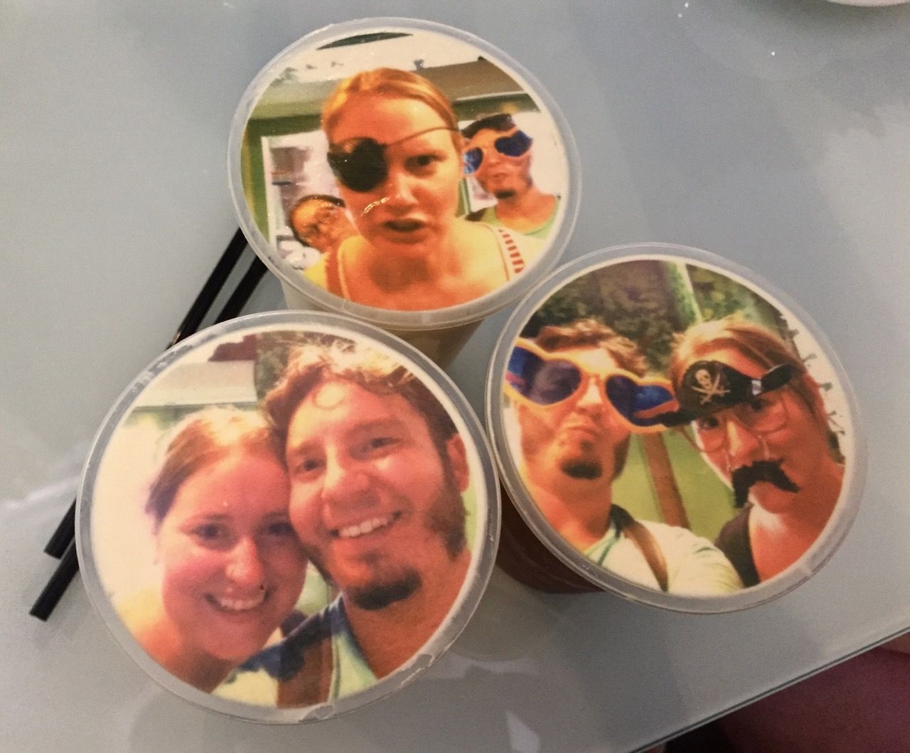 Iced coffee drinks with photos printed on the milk foam.