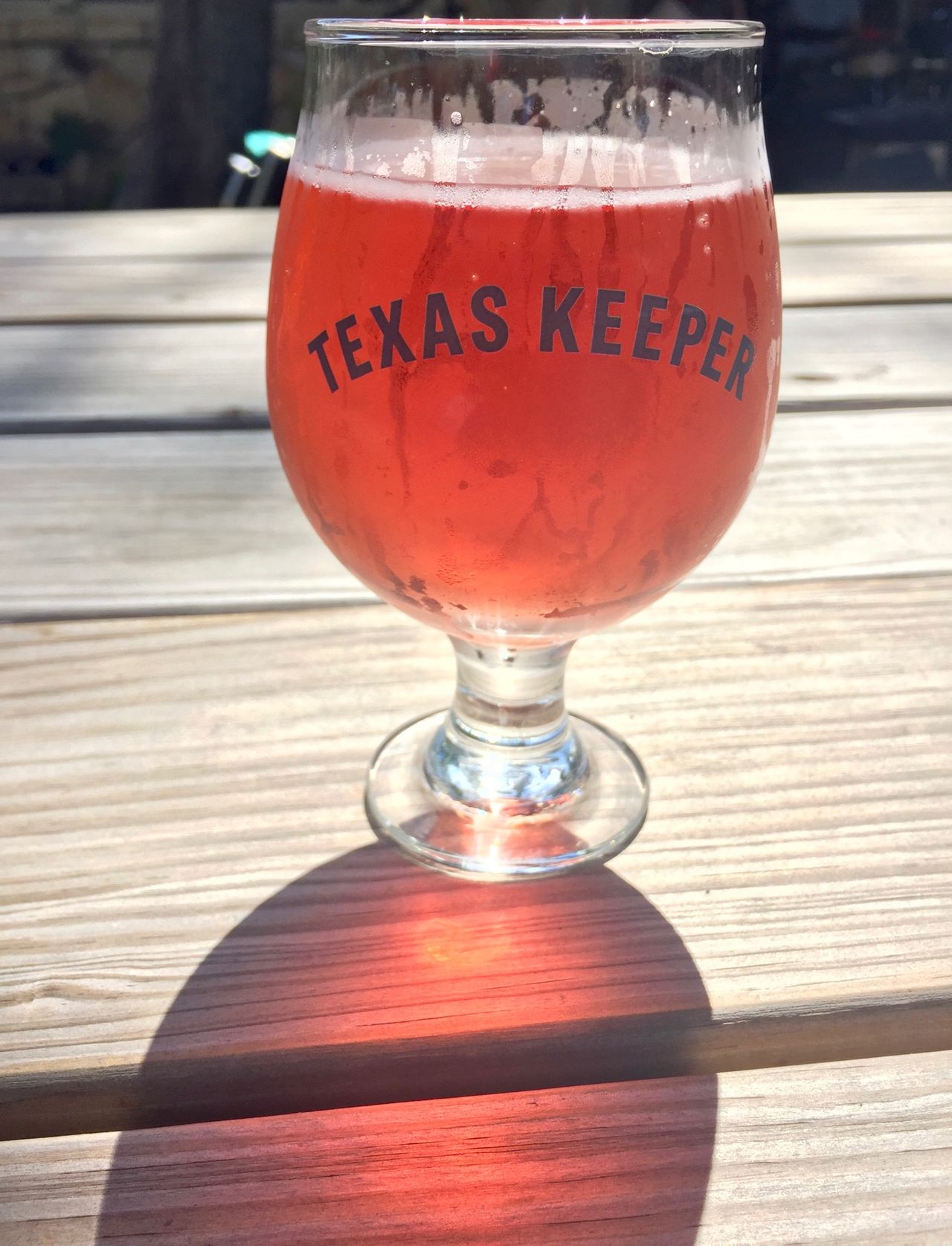 Red cider lit by the sun.