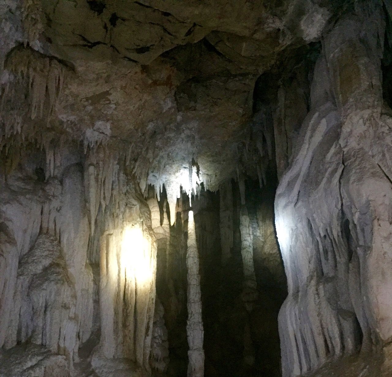 A stalagmite and stalagtite which are very close to forming a solid column.