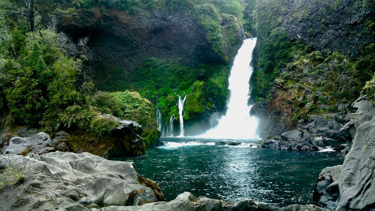 Wide angle shot of the Huilo Huilo waterfall.